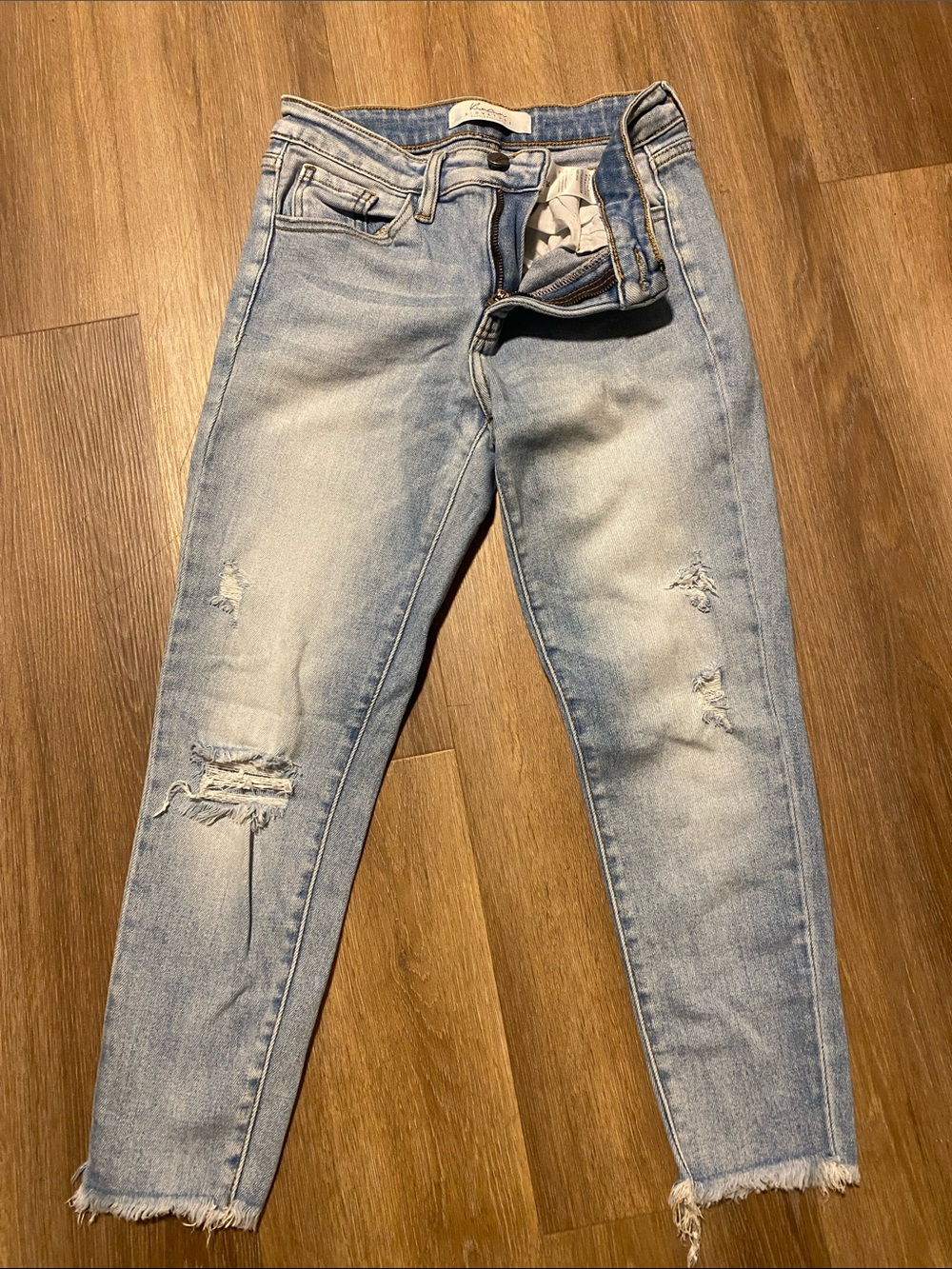 Light Wash Distressed Kancan Buckle Exclusive Women's Jeans - Skinny Crop